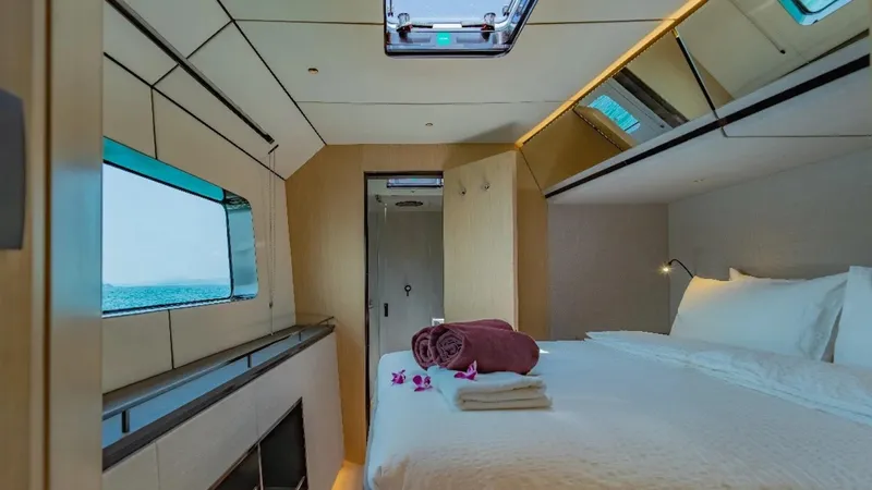 Jack Yacht Photos Pics Luxurious McConaghy MC75 2023 yacht bedroom with modern design and ocean view.