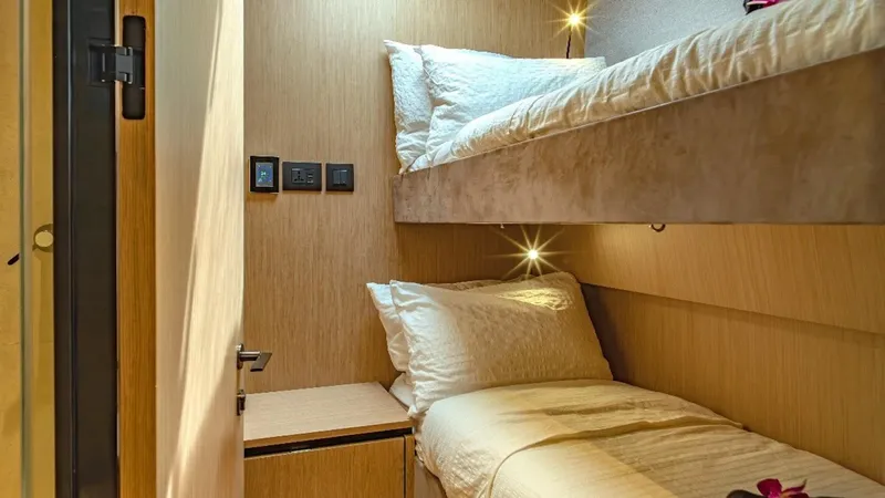 Jack Yacht Photos Pics 2023 McConaghy MC75 yacht cabin with cozy bunk beds and modern lighting.