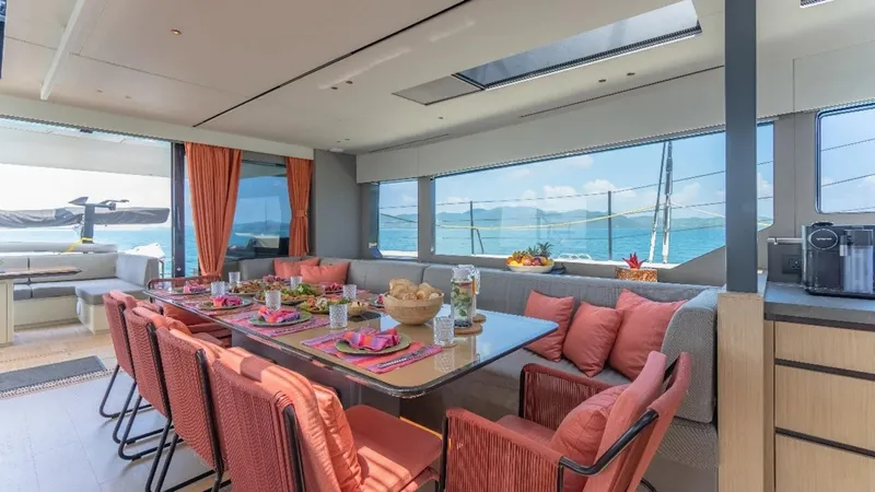 Jack Yacht Photos Pics Luxurious 2023 McConaghy MC75 yacht interior with elegant dining area and ocean views.