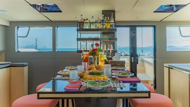 Jack Yacht Photos Pics Luxurious dining area on 2023 McConaghy MC75 yacht with ocean view.