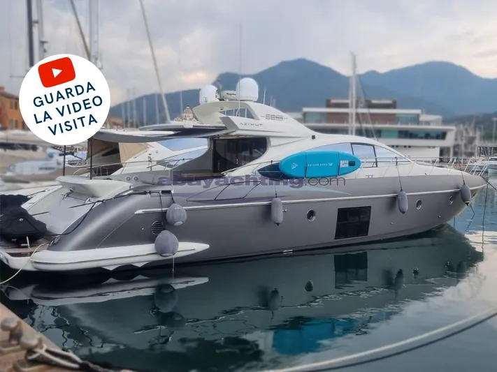  Yacht Photos Pics Azimut 68S 2004 yacht docked in marina, with mountains in background.