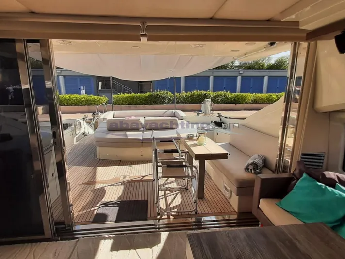  Yacht Photos Pics Luxurious 2004 Azimut 68S yacht interior with elegant seating and dining area.