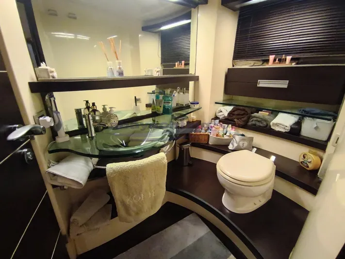  Yacht Photos Pics Luxurious bathroom in 2004 Azimut 68S yacht with modern fixtures and elegant design.