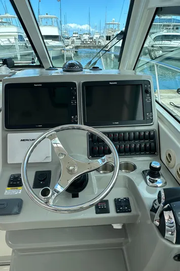  Yacht Photos Pics 2015 Boston Whaler 345 Conquest helm with dual screens and steering wheel.