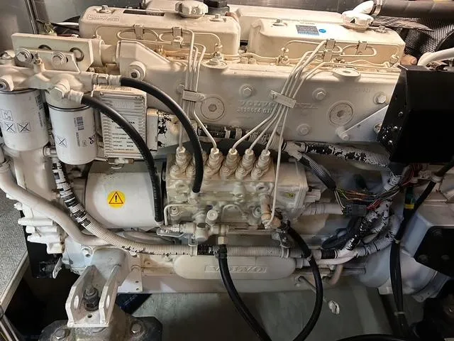River Dancer Yacht Photos Pics Engine of a 2004 Carver 466 Motor Yacht, showcasing intricate wiring and components.
