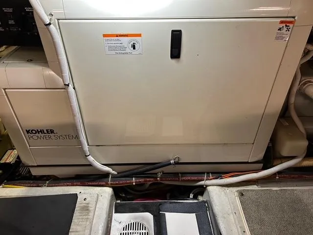 River Dancer Yacht Photos Pics Engine room of 2004 Carver 466 Motor Yacht with Kohler power system.