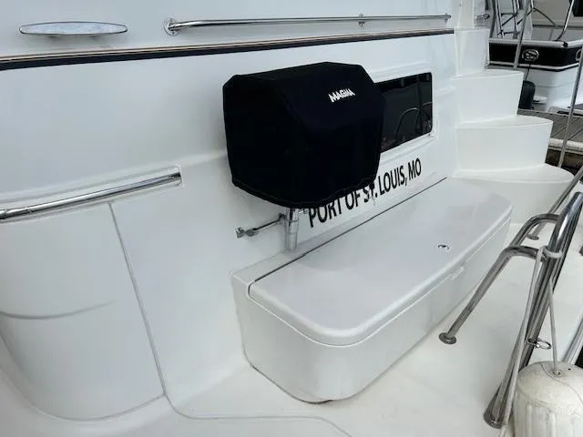 River Dancer Yacht Photos Pics 2004 Carver 466 Motor Yacht deck with grill and seating, Port of St. Louis, MO.