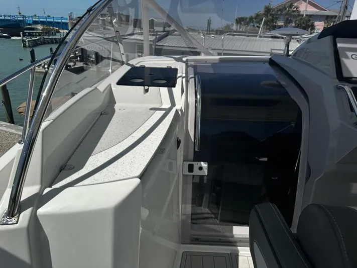 Keys Please! Yacht Photos Pics 2024 Jeanneau Leader 9.0 WA boat deck with sleek design and modern features.