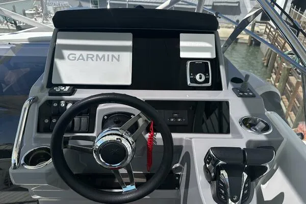 Keys Please! Yacht Photos Pics 2024 Jeanneau Leader 9.0 WA helm with Garmin navigation system and controls.