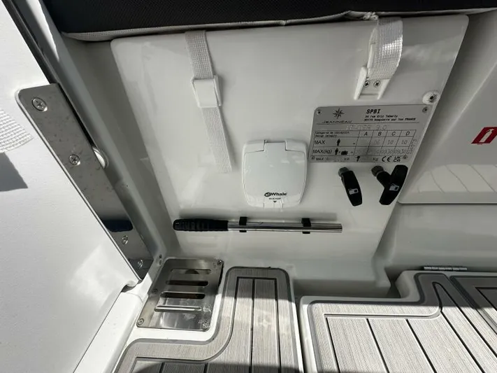 Keys Please! Yacht Photos Pics 2024 Jeanneau Leader 9.0 WA boat interior, featuring control panel and deck details.