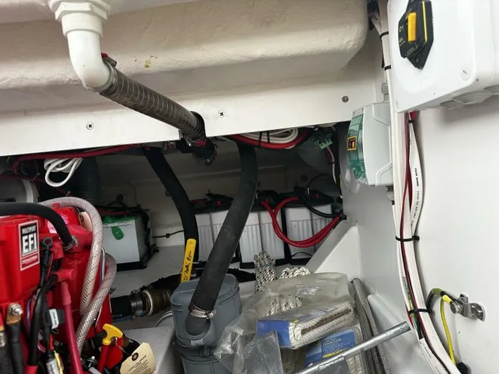 Keys Please! Yacht Photos Pics Engine compartment of 2024 Jeanneau Leader 9.0 WA, showcasing wiring and components.