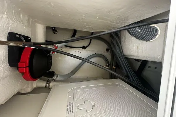 Keys Please! Yacht Photos Pics 2024 Jeanneau Leader 9.0 WA engine compartment with hoses and wiring.