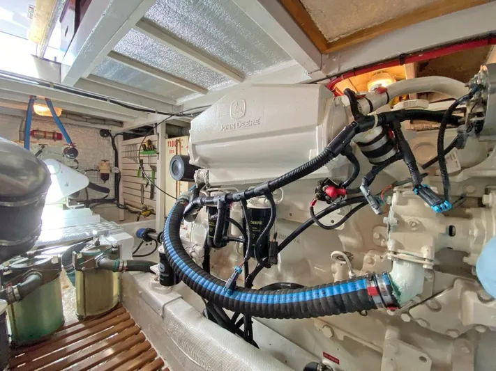  Yacht Photos Pics Engine room of a 1981 Grand Banks 42 Europa, featuring a well-maintained marine engine.