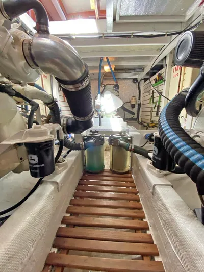  Yacht Photos Pics Engine room of 1981 Grand Banks 42 Europa with visible components and piping.