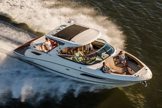  Yacht Photos Pics Manufacturer Provided Image: 2019 Sea Ray SLX 350 cruising on water with passengers.