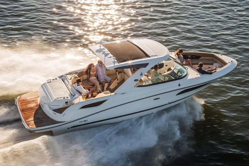  Yacht Photos Pics Manufacturer Provided Image: 2019 Sea Ray SLX 350 cruising on water with passengers enjoying the ride.