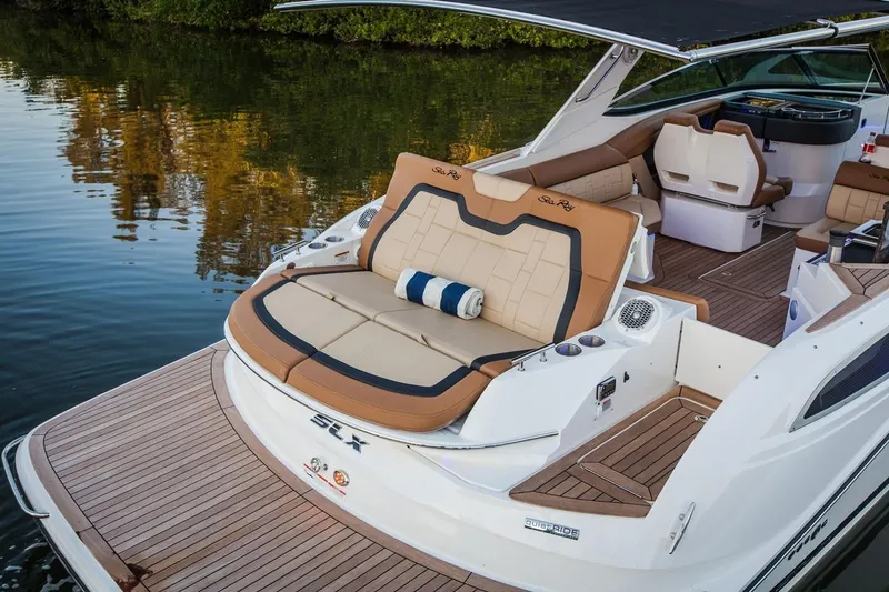  Yacht Photos Pics Manufacturer Provided Image: 2019 Sea Ray SLX 350 luxury boat with spacious sun deck and elegant interior.