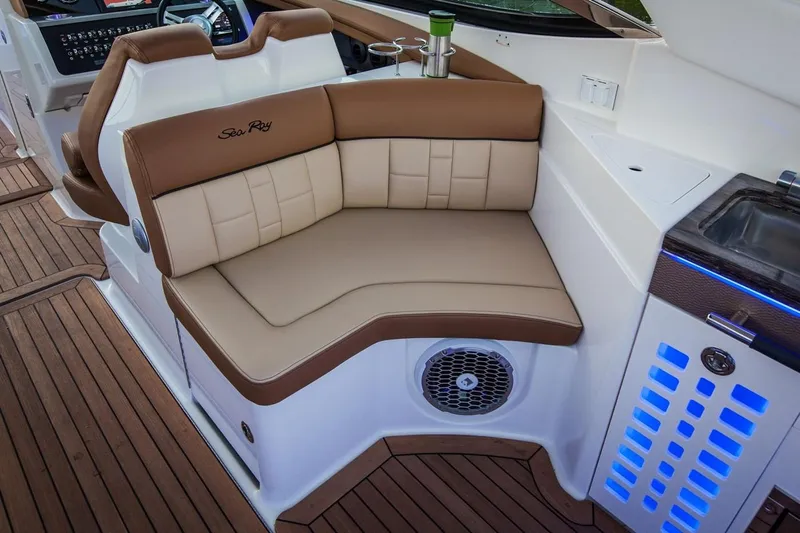  Yacht Photos Pics Manufacturer Provided Image: 2019 Sea Ray SLX 350 boat interior with tan leather seating and wood flooring.