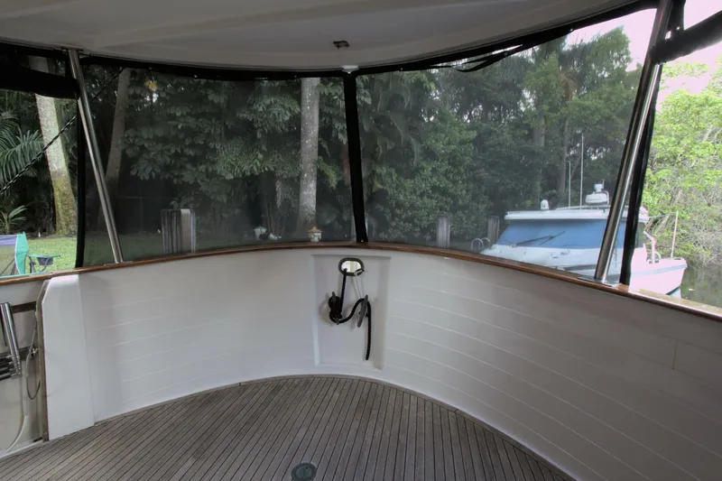 Ursa Minor Yacht Photos Pics Enclosed deck area of 1988 Kadey-Krogen Krogen 54 yacht with scenic view.