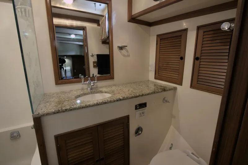 Ursa Minor Yacht Photos Pics Elegant bathroom in 1988 Kadey-Krogen Krogen 54 yacht with granite countertop.