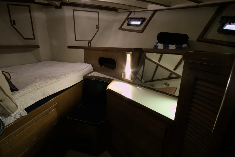Ursa Minor Yacht Photos Pics 1988 Kadey-Krogen Krogen 54 yacht interior with cozy cabin and wooden furnishings.