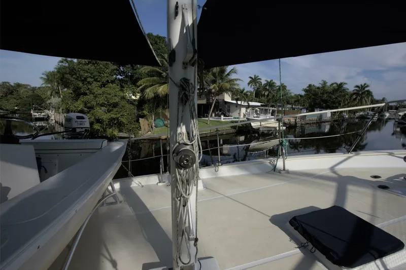 Ursa Minor Yacht Photos Pics 1988 Kadey-Krogen Krogen 54 yacht deck with tropical waterfront view.