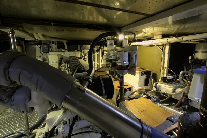 Ursa Minor Yacht Photos Pics Engine room of 1988 Kadey-Krogen Krogen 54 yacht, showcasing mechanical components and piping.