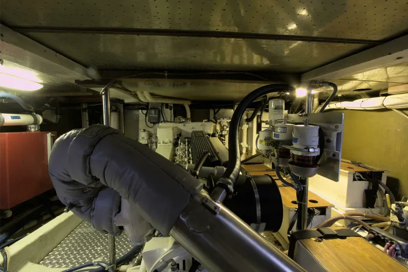 Ursa Minor Yacht Photos Pics Engine room of 1988 Kadey-Krogen Krogen 54 yacht, showcasing mechanical components and piping.