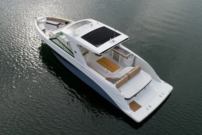 Sensei I Yacht Photos Pics Manufacturer Provided Image: 2021 Sea Ray SLX 400 luxury boat on calm water.