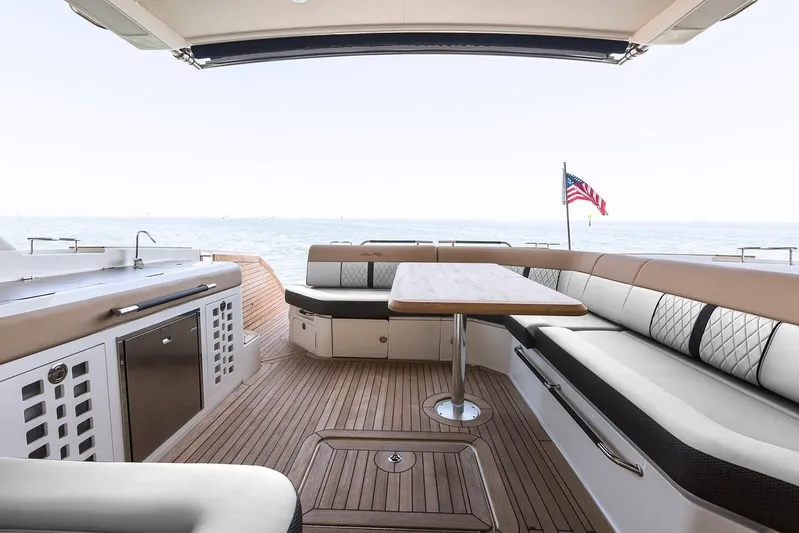 Sensei I Yacht Photos Pics Manufacturer Provided Image: Spacious deck of 2021 Sea Ray SLX 400 yacht with seating and table.