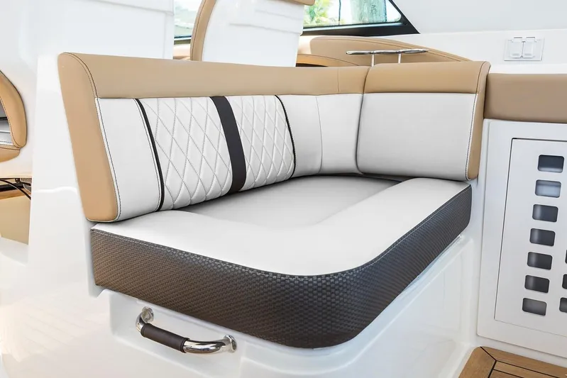 Sensei I Yacht Photos Pics Manufacturer Provided Image: 2021 Sea Ray SLX 400 boat interior seating with beige and white upholstery.