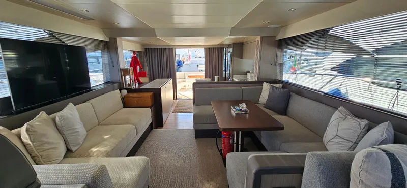  Yacht Photos Pics Luxurious interior of 2019 Sunseeker Manhattan 66 yacht with elegant seating and modern decor.