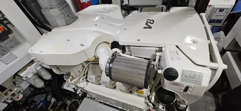 Yacht Photos Pics Engine room of a 2019 Sunseeker Manhattan 66 yacht, featuring a V8 engine.
