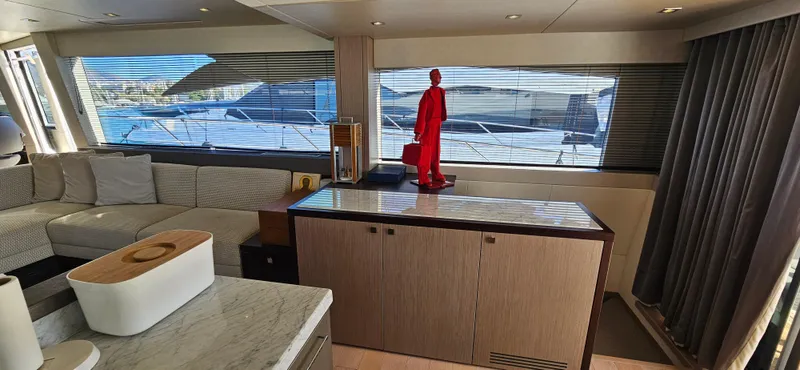  Yacht Photos Pics Luxurious interior of 2019 Sunseeker Manhattan 66 yacht with modern decor and large windows.