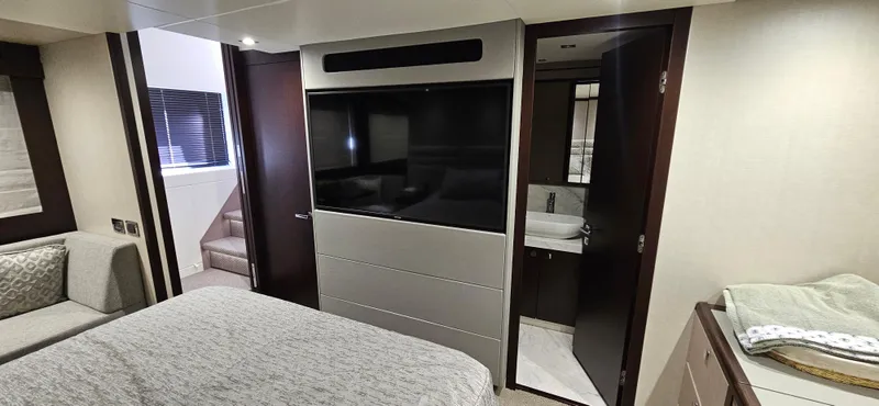  Yacht Photos Pics Luxurious interior of 2019 Sunseeker Manhattan 66 yacht cabin with modern amenities.