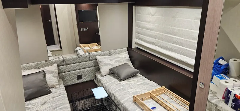  Yacht Photos Pics Interior of 2019 Sunseeker Manhattan 66 yacht with twin beds and modern decor.