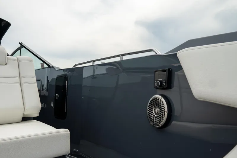 Di Blue Yacht Photos Pics 2022 Cruisers Yachts 38 GLS interior with white seating and audio system.