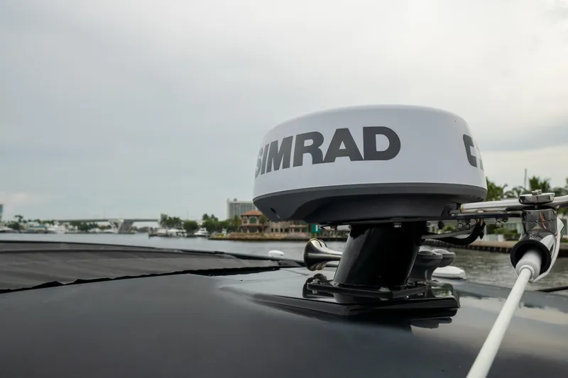 Di Blue Yacht Photos Pics 2022 Cruisers Yachts 38 GLS with Simrad radar on deck, dockside view.