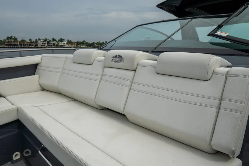 Di Blue Yacht Photos Pics Luxurious seating on 2022 Cruisers Yachts 38 GLS, featuring plush white upholstery.