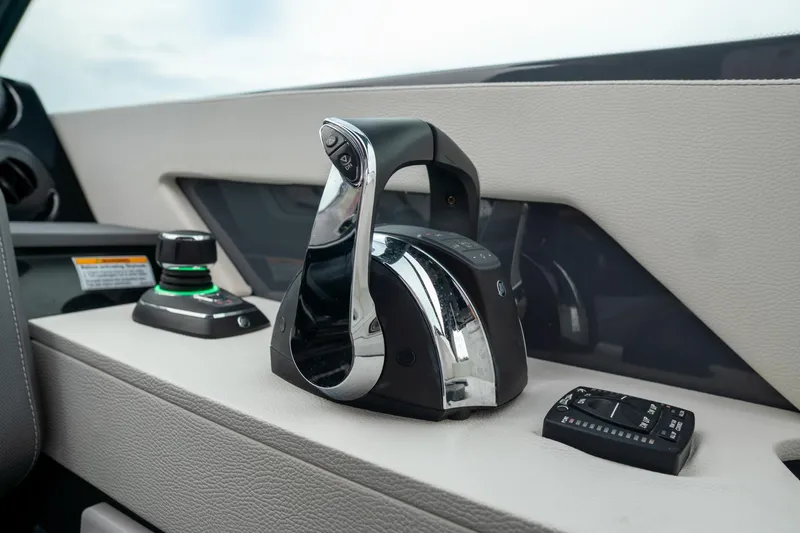 Di Blue Yacht Photos Pics 2022 Cruisers Yachts 38 GLS throttle controls and dashboard details.