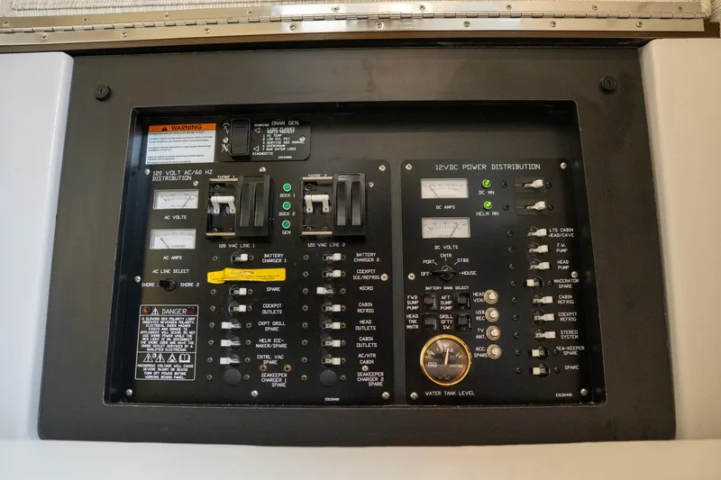 Di Blue Yacht Photos Pics Electrical control panel of 2022 Cruisers Yachts 38 GLS, featuring switches and indicators.