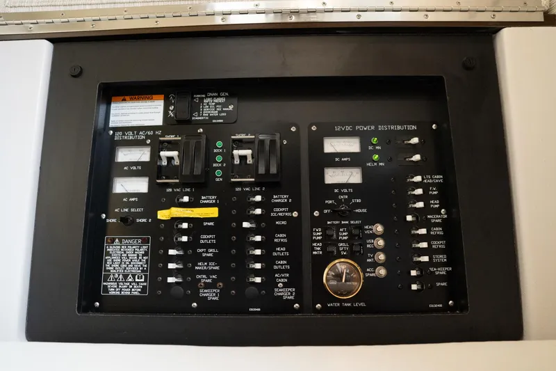 Di Blue Yacht Photos Pics Electrical control panel on 2022 Cruisers Yachts 38 GLS, featuring switches and indicators.