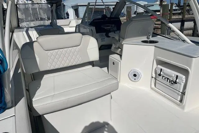  Yacht Photos Pics 2024 World Cat 280 DC-X boat interior with white seating and modern design.