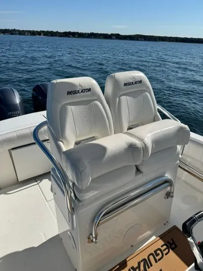  Yacht Photos Pics 2015 Regulator 25 boat seats with ocean view in background.