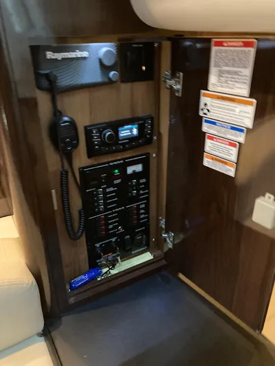  Yacht Photos Pics Control panel inside 2016 Sea Ray 330 Sundancer boat, featuring Raymarine equipment.