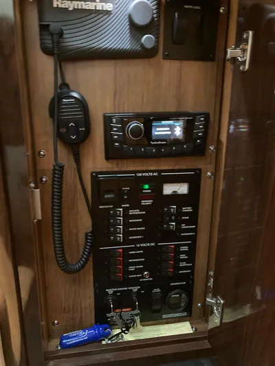  Yacht Photos Pics Control panel of a 2016 Sea Ray 330 Sundancer boat with communication equipment.