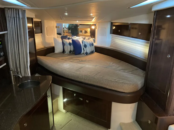  Yacht Photos Pics Luxurious 2016 Sea Ray 330 Sundancer cabin with cozy bed and elegant decor.