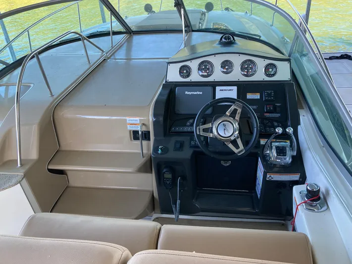  Yacht Photos Pics 2016 Sea Ray 330 Sundancer helm with modern controls and steering wheel.