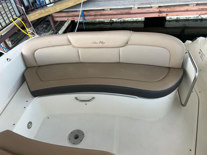  Yacht Photos Pics 2016 Sea Ray 330 Sundancer boat seating area with beige upholstery.