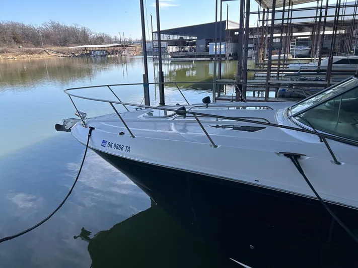 Yacht Photos Pics 2016 Sea Ray 330 Sundancer docked at a marina, calm water reflection.